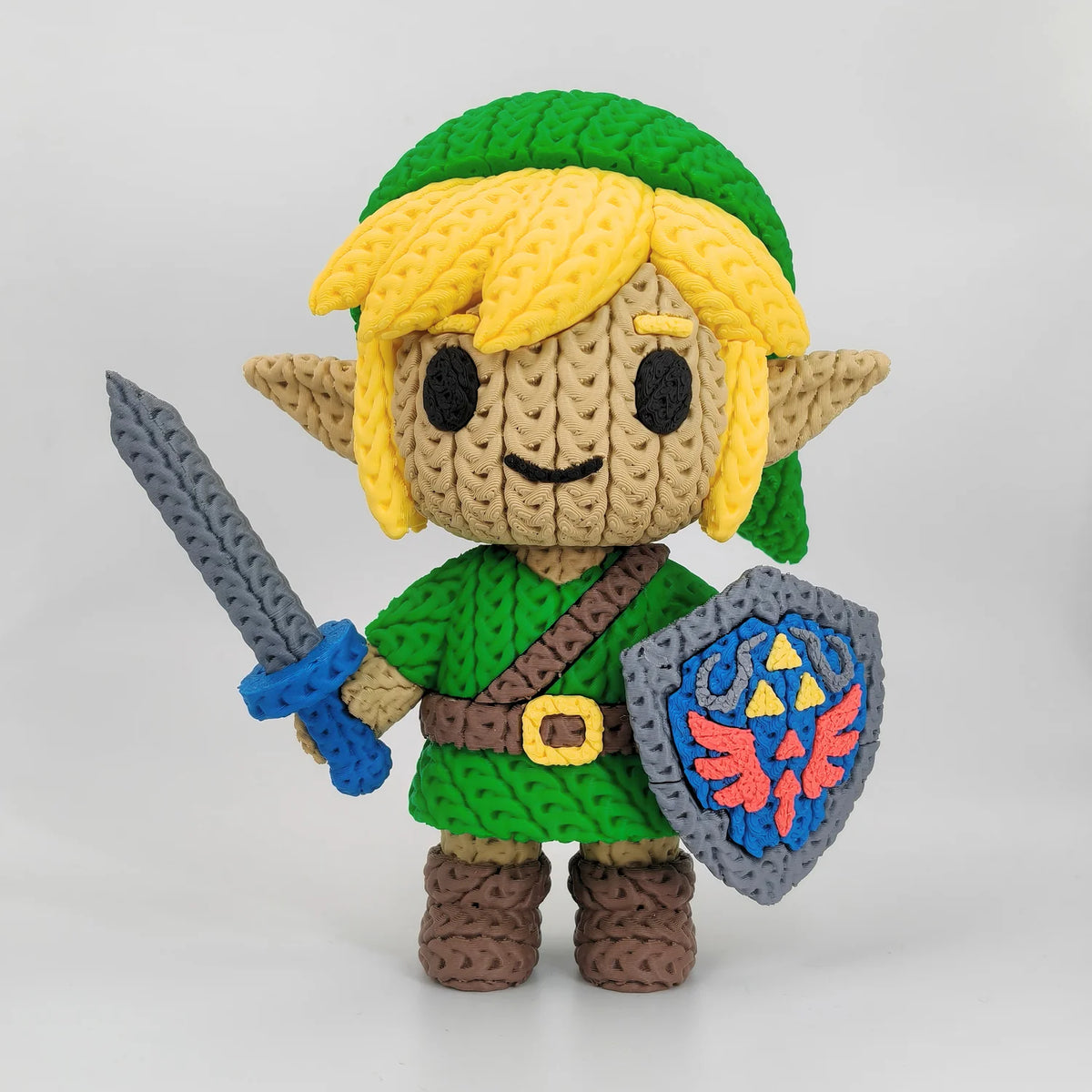KNITTED Link, figura impresa en 3D con efecto crochet, vista frontal
